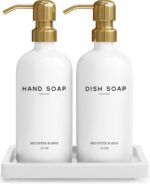 Elegant gold glass hand and dish soap dispenser set by Brighter Barns with two bottles and a ceramic tray.