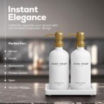 Elegant gold glass hand and dish soap dispenser set by Brighter Barns with two bottles and a ceramic tray.