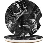 A pair of round black marble patterned ceramic stone car coasters with a cork base, designed to fit vehicle cupholders.