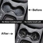 A pair of round black marble patterned ceramic stone car coasters with a cork base, designed to fit vehicle cupholders.