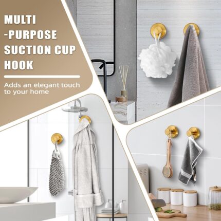 Two round brushed gold Fenas suction cup hooks mounted on a white tiled shower wall, holding a towel and a loofah.
