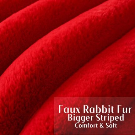 Two red faux rabbit fur throw pillow covers with a striped pattern, positioned on a neutral background.