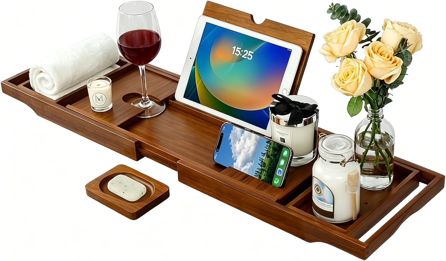 kiasthome-expandable-solid-teak-wood-bathtub-caddy-tray-dark-natural-teak-01 Kiasthome expandable teak wood bathtub caddy tray in dark natural teak, holding a book, wine glass, and soap.