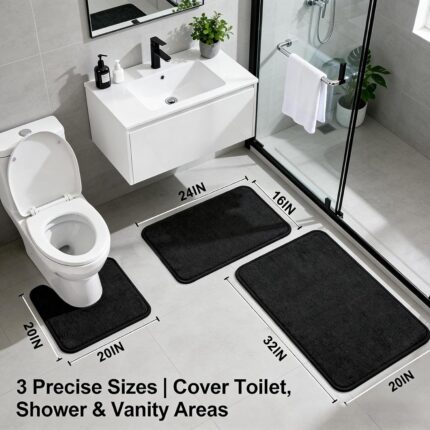 Three-piece RUN HELIX black memory foam bath rug set on a tile floor, showing large, small, and U-shape mats.