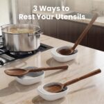 A complete 12-piece SMIRLY acacia wood utensil set with ceramic holder and spoon rest on a kitchen counter.