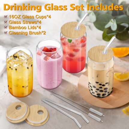 Four clear 16 oz sungwoo glass cups with bamboo lids and reusable straws, arranged neatly on a surface.