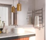 A sleek, polished 304 stainless steel electric towel warmer with six bars, mounted on a bathroom wall.
