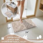 A rectangular Yimobra Khaki Chenille Bath Mat, thick and fluffy, placed on a light-colored bathroom floor.