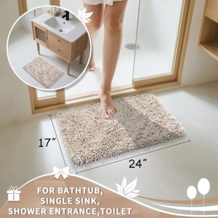 A rectangular Yimobra Khaki Chenille Bath Mat, thick and fluffy, placed on a light-colored bathroom floor.