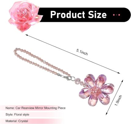 A vibrant Zigeiya pink crystal 3D flower charm hanging, reflecting colorful light against a soft background.